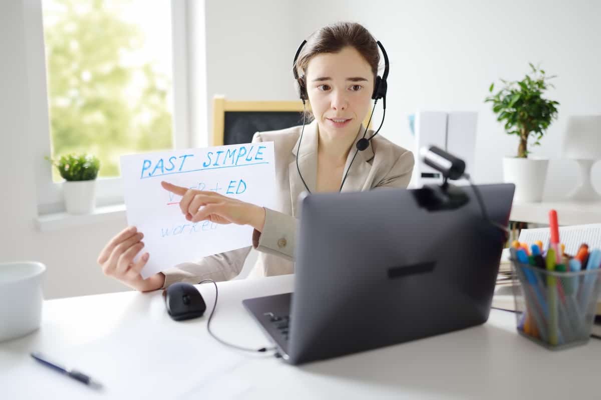 young-woman-is-teaching-english-with-laptop-comput-2022-08-01-03-20-28-utc teaching online